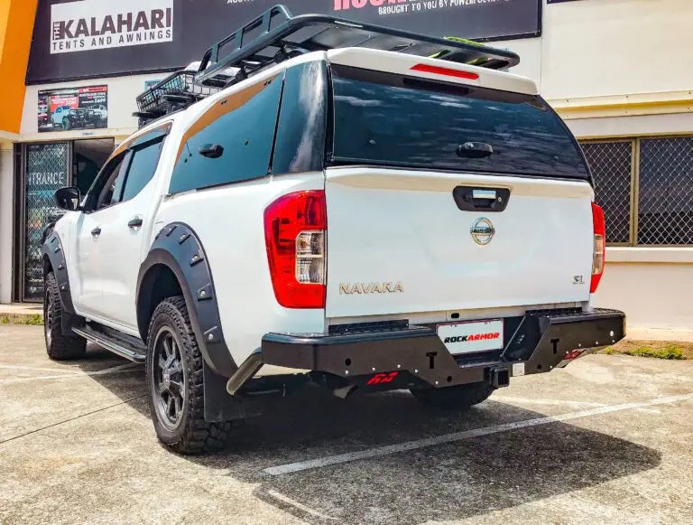 White Nissan Navara pickup truck with rear step in vehicle collection named Rear Step