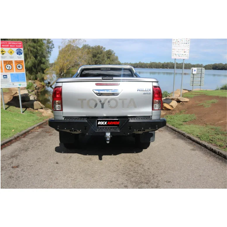Silver Toyota Hilux pickup truck with rear step and tow bar for N80 2015+ models