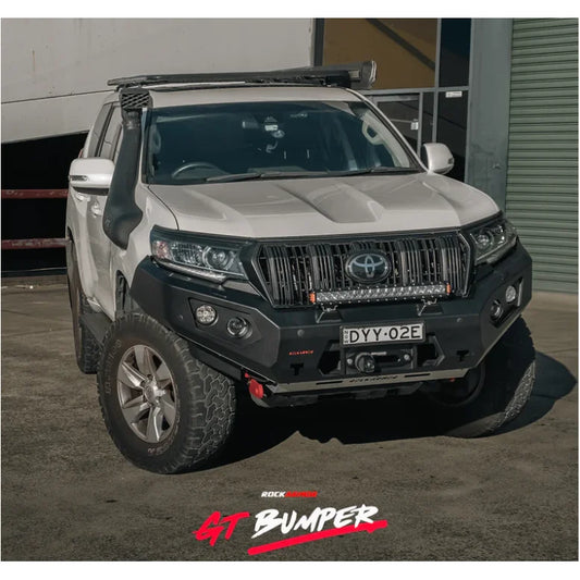 White Toyota Prado with aftermarket Rockarmor GT Steel Hoopless Bullbar installed