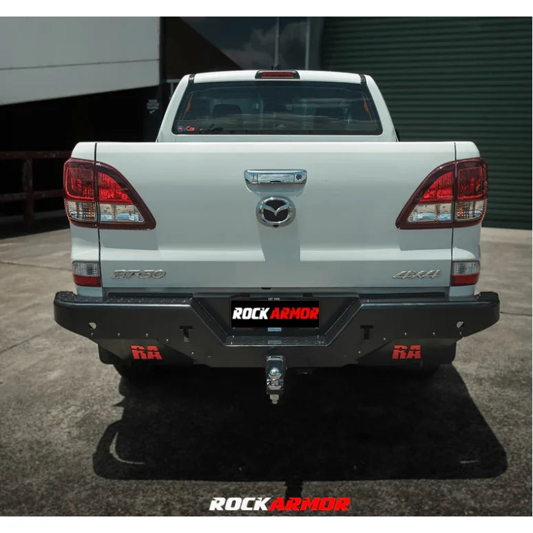 White mazda pickup truck rear showing rockamor elite steel rear step towbar for bt50 2011-2020
