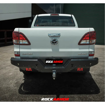 White mazda pickup truck rear showing rockamor elite steel rear step towbar for bt50 2011-2020