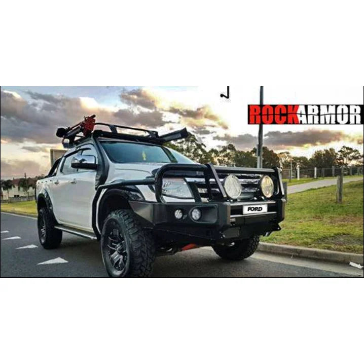 Modified white ford ranger px1 with rockarmor brush bars and rockslider for enhanced off-road protection