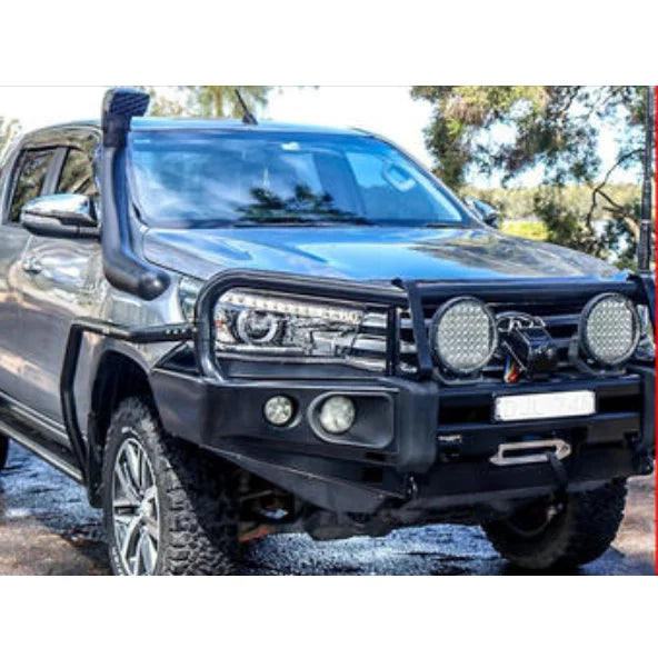 Modified gray pickup truck fitted with rockarmor brushbar for toyota hilux n80 2015-2020 and rockarmor rockslider