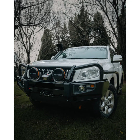White rockarmor premium steel brush bar fitted to Toyota Prado 150 series with black GT toyota prado bull bar