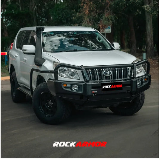 Silver off-road toyota prado bull bar with black rockarmor elite steel and airbag compatible fog lights