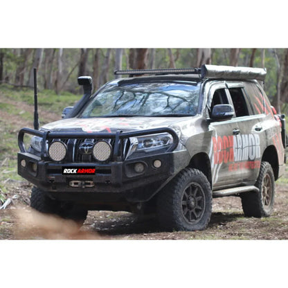 Off-road Toyota Prado FJ150 with black Rockarmor Elite steel bull bar replacement full bar for enhanced protection