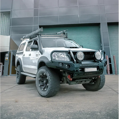 White off-road pickup truck with Hoop Steel Bullbar for maximum frontal protection