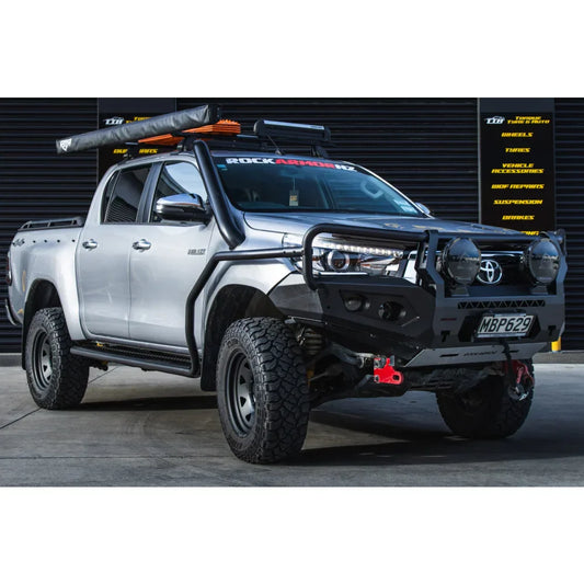 Silver Toyota Hilux N80 with rockarmor gt hoop steel bullbar featuring rated recovery points full bar replacement