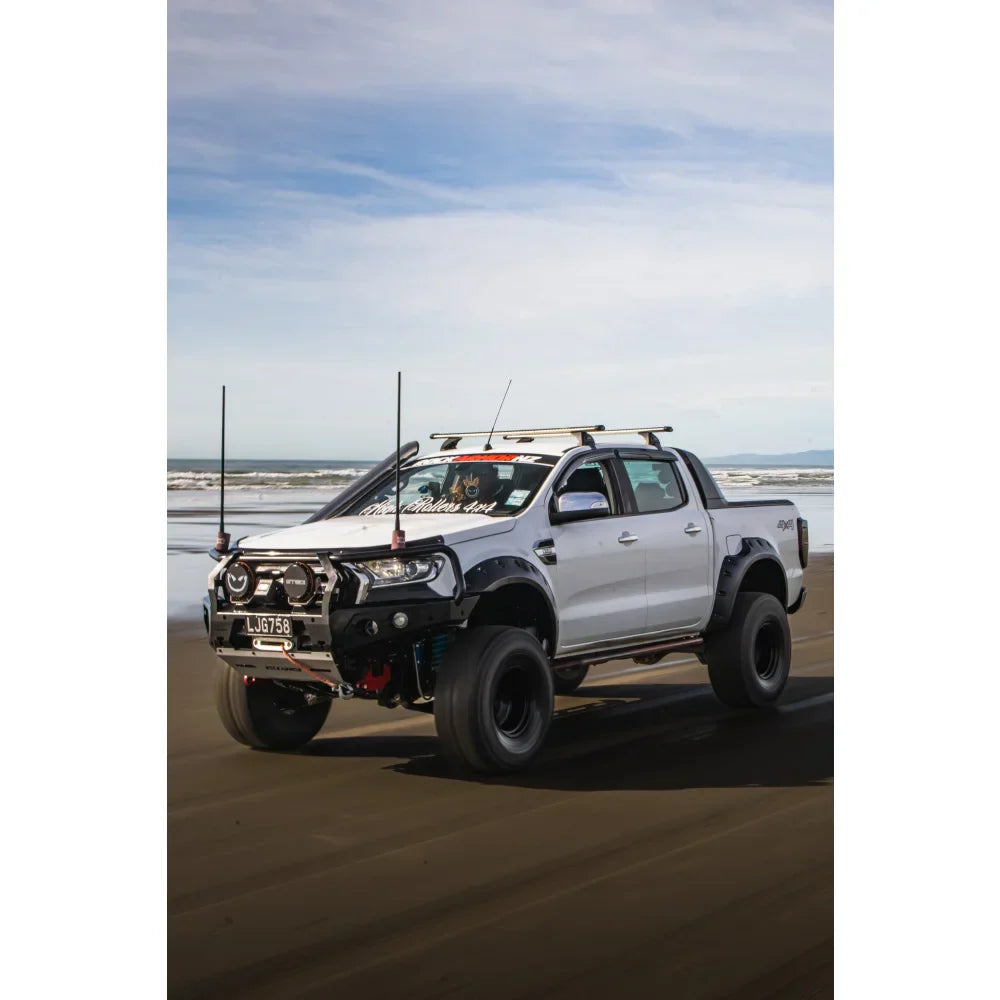 Modified white Ford Ranger PX2 pickup truck equipped with rockarmor gt steel hoop bullbar and synthetic winch rope combo pack