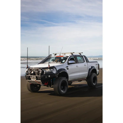 Modified white Ford Ranger PX2 pickup truck equipped with rockarmor gt steel hoop bullbar and synthetic winch rope combo pack