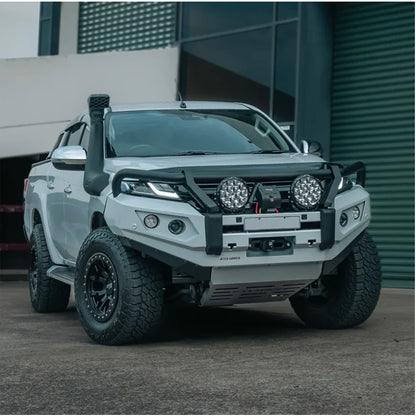 Modified white pickup truck with Rockarmor GT Steel Hoop Bullbar on Mitsubishi Mr Triton