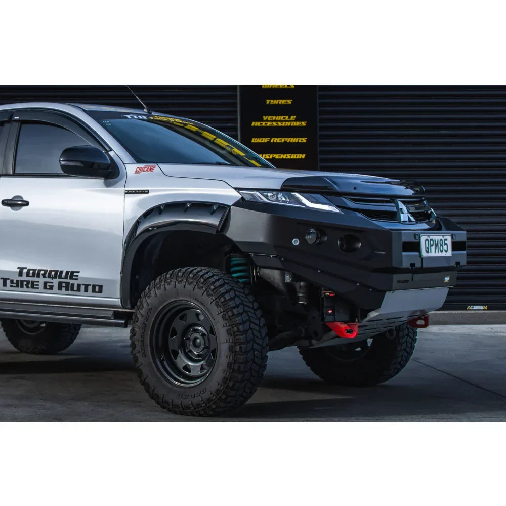 Silver Mitsubishi Triton pickup truck fitted with rockarmor gt steel hoopless bullbar featuring rated recovery points