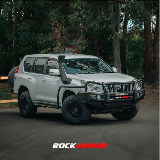White toyota prado fj150 fitted with rockarmor premium steel bullbar with led fog lights suit toyota prado