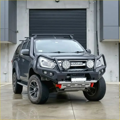 Black isuzu d-max 2017-2020 with rockarmor rock pack featuring gt hoop bullbar roof rack and rock sliders for off-road use