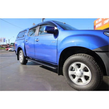 Blue four-door Isuzu Dmax dual cab fitted with rockarmor steel rockslider side steps compatible with brush bar