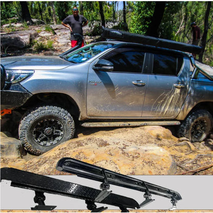 Silver off-road pickup featuring rockarmor steel rockslider checker plate step compatible with brush bar for toyota hilux n90 2026+