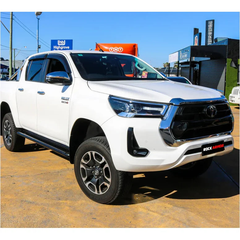 White toyota hilux n90 2026 with rockarmor steel rockslider checker plate step brush bar compatible side steps rear view